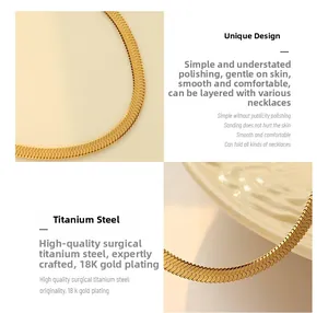 Detail of 18K gold plated surgical titanium steel flat snake chain necklace with high polish