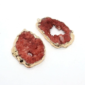 Irregular natural red crystal stone pendants with elegant gold plated edges and rings