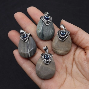Natural teardrop agate pendants with evil eye diamond charms in silver plating