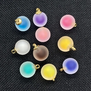 Set of ten 16mm matte acrylic round ball pendants in assorted colors with gold rings