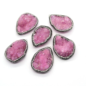 Natural druzy quartz drop pendants with black metal borders and shimmering rhinestones