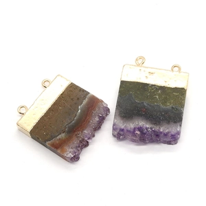 Natural purple amethyst cluster pendant with gold plated edges and double connector rings
