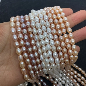 Natural AAA high-luster freshwater rice pearls in white, pink, and lavender colors