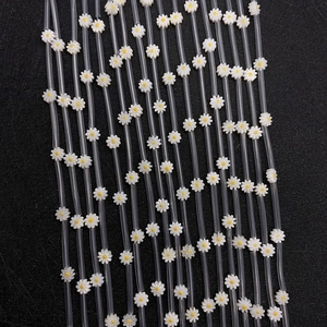 Natural sea shell daisy flower beads with white petals and yellow centers for DIY jewelry