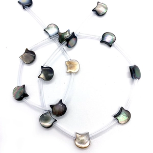 Natural shimmering shell beads in owl shape with iridescent luster for DIY jewelry making
