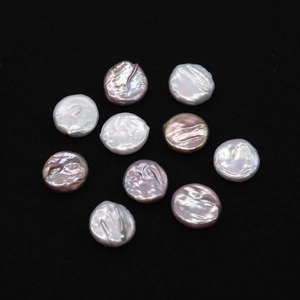 Macro detail of 19-20mm baroque coin pearls in white and pink for DIY jewelry making