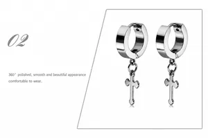 Detail showing 360-degree polished silver cross hoop earrings with a mirror finish