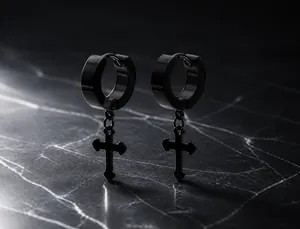 Detailed view of black titanium steel hoop earrings with vacuum plated cross charms