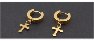 Macro detail of gold-plated stainless steel cross pendant huggie hoop earrings