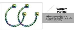Close-up of iridescent rainbow twisted horseshoe rings with durable vacuum plating finish