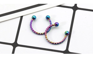 Rainbow horseshoe piercing rings with twisted spiral design and dual spherical ends