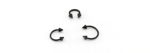 Three pieces of matte black horseshoe rings with double-sided spikes for body piercing