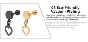 Detail of vacuum-plated heart pendant earrings in black and gold finish with smooth texture