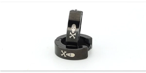 Close-up of black stainless steel hinge hoop earrings with silver skull and crossbones