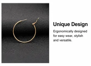 Detailed view of polished golden hoop earring with secure pin closure mechanism