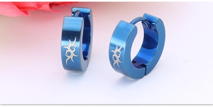 Macro detail of blue electroplated stainless steel earrings with laser engraved patterns