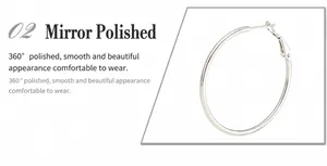 Detailed view of polished silver hoop earrings showing mirror-finish and secure closure