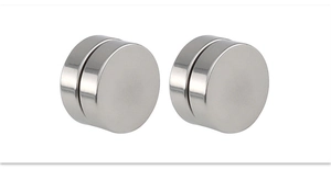 Macro shot of silver magnetic clip-on earrings with polished titanium steel finish