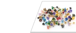Macro view of multi-color 6mm AAA cubic zirconia studs with titanium steel four-claw setting