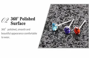 Dettaglio macro di orecchini con zirconi 4mm AAA e castone a 4 griffe in acciaio