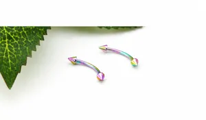 Rainbow surgical steel curved barbell eyebrow rings with sharp conical spikes and spikes