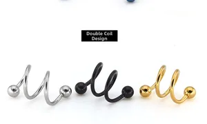 Detailed view of titanium steel double spiral piercing rings in silver black and gold colors