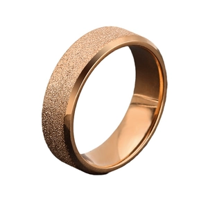 Elegant rose gold frosted stainless steel ring with polished edges on white background