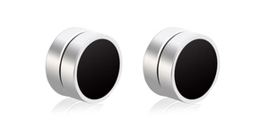 Detail of round black magnetic clip-on earrings with polished silver stainless steel frame