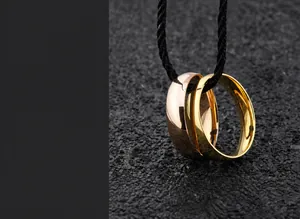 Macro shot of gold and rose gold rings featuring vacuum plating and mirror polished finish