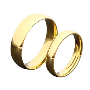 Polished gold stainless steel dome rings for couples with a sleek mirror finish