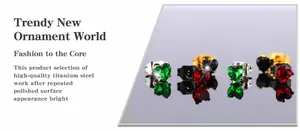 Boucles d'oreilles cœur en acier titane avec zircons brillants rouges, verts et noirs