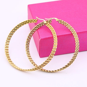 Golden titanium steel hoop earrings featuring a stylish twisted rope woven texture design