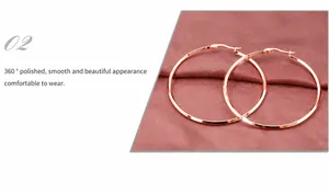 Close-up of rose gold stainless steel hoop earrings with 360-degree mirror polishing