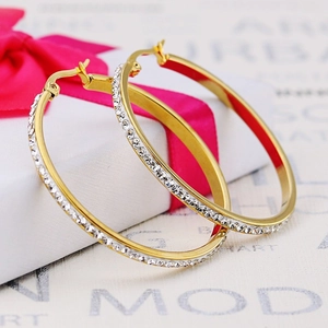 Elegant gold plated hoop earrings with micro paved white crystals and snap closure