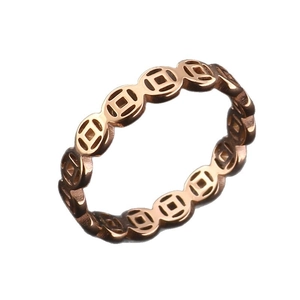 Vintage hollow coin pattern titanium steel ring in rose gold finish for a lucky motif