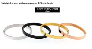 Detail of 6mm wide stainless steel bangles in silver, black, gold, and rose gold finishes