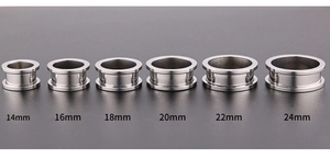 Size comparison of stainless steel ear gauges from 14mm to 24mm on a grey background