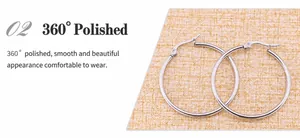 Detailed close-up of mirror-polished silver stainless steel hoop earrings with hinged clasp