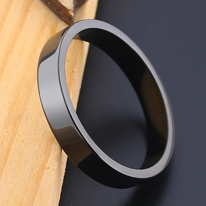 Polished black stainless steel plain band ring with a high-gloss mirror finish for men and women