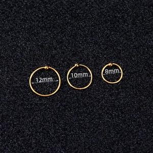 Tres aros con bola cautiva de acero dorado en 8mm, 10mm y 12mm para piercings corporales