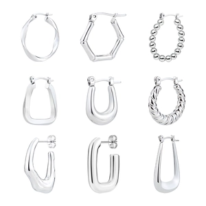 Set di nove orecchini a cerchio geometrici in acciaio al titanio argento da donna