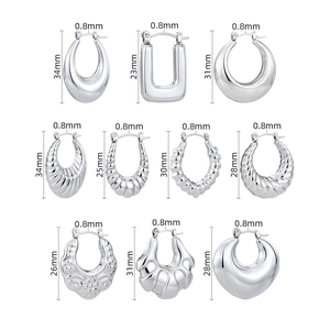 Ensemble de dix boucles d'oreilles créoles en acier argenté aux formes variées de 0,8 mm