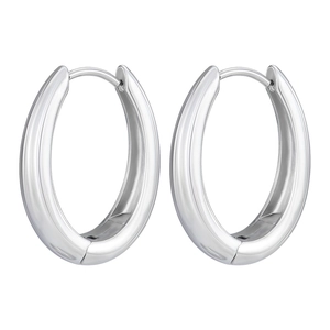 Macro detail of high-polished silver thick oval hoop earrings with smooth metal surface