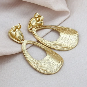 Exaggerated irregular golden hollow teardrop earrings with matte water ripple texture