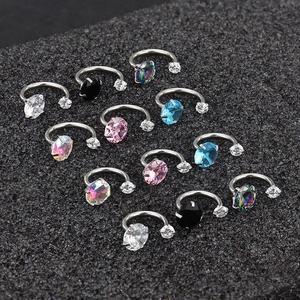 Minimalist horseshoe piercing rings in various gem colors for nose and cartilage sets