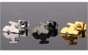Detailed view of titanium steel faucet earrings in silver, black, and gold metallic finishes