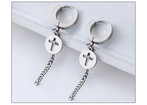 Macro detail of silver stainless steel earrings with hollow cross and cuban chain link
