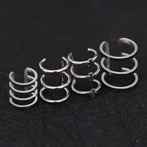 Polished stainless steel ear cuff set with flower and cross charms for non-pierced ears