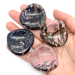 Polished natural heart-shaped Rhodonite worry stones with thumb groove for stress relief