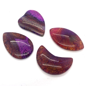 Dragon vein agate gemstone pendants in heart, teardrop, oval, and crescent shapes